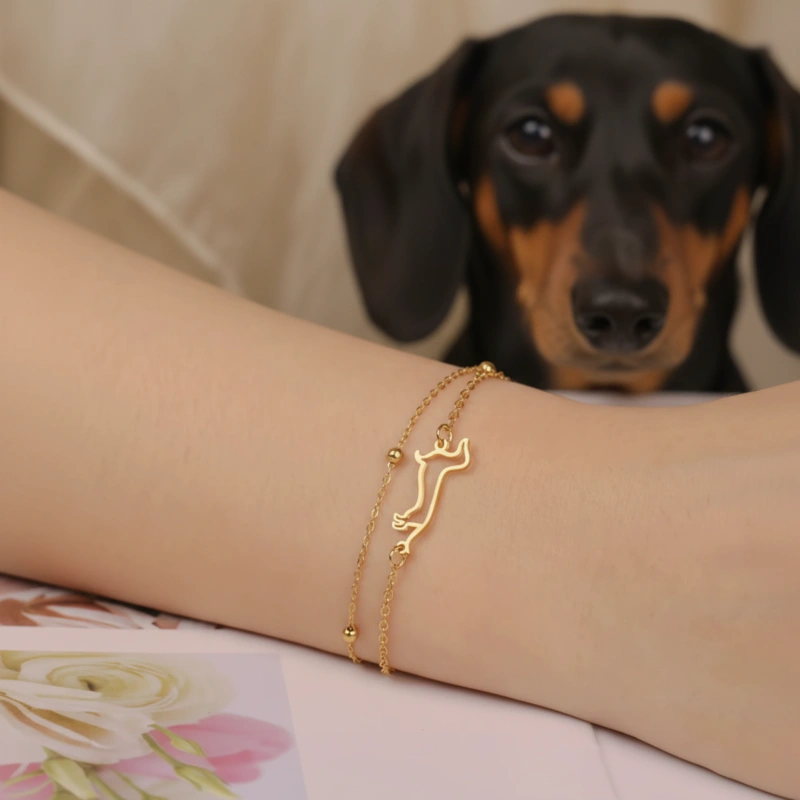 Bracelet double chaîne teckel silhouette or